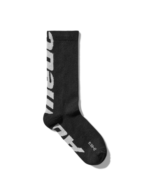 Sock full view: “Mental Athletic wool socks with blue logo, full frontal view.