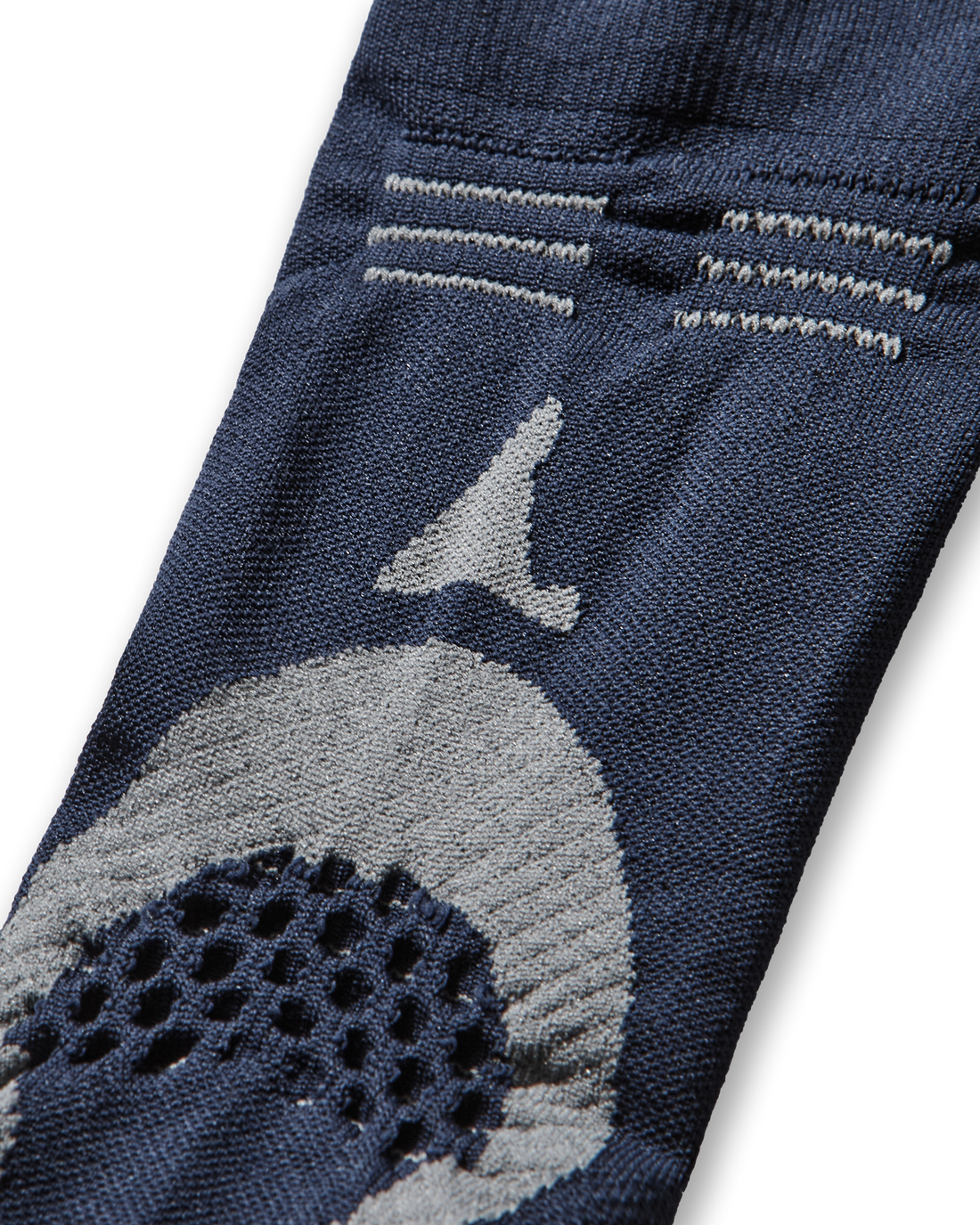 Close-up of the upper section of the sock showing the ROA logo and contrast knit texture.