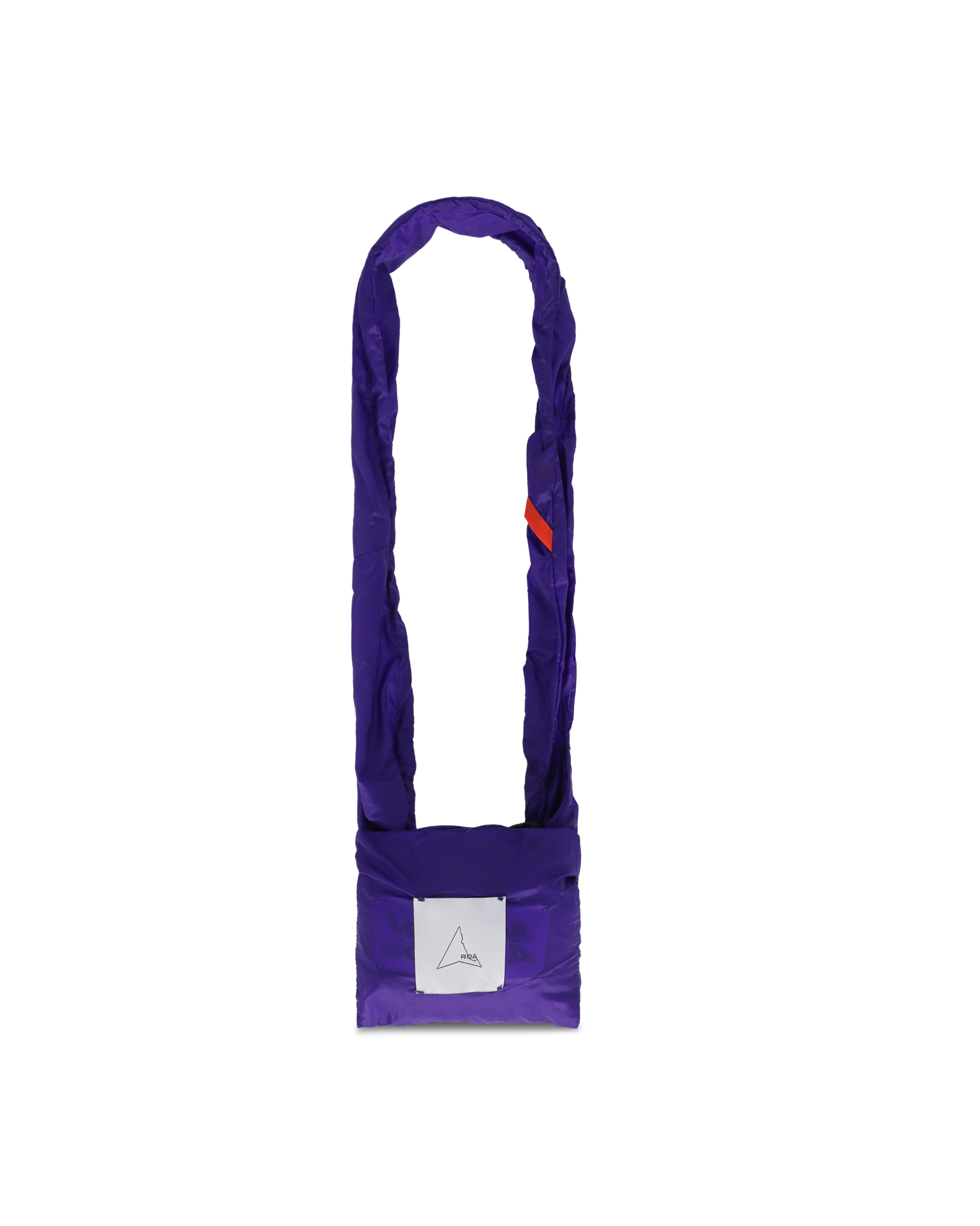 Profile view of the purple knot bag with elongated handle and visible logo print.