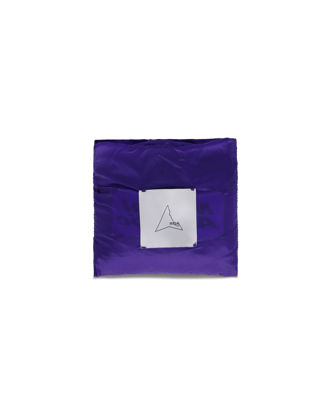 Flat lay of the folded purple ROA x Mental Athletic bag in its compact packable form with the ROA logo label.
