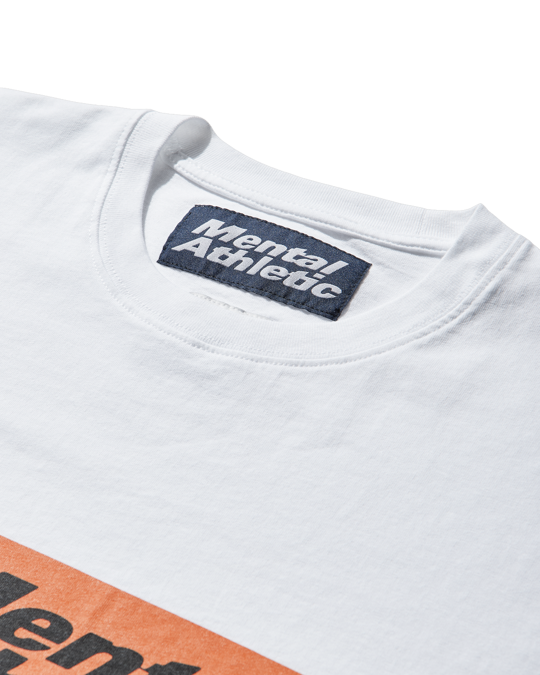 Close-up of the ribbed collar and interior label of the white ROA x Mental Athletic T-shirt.