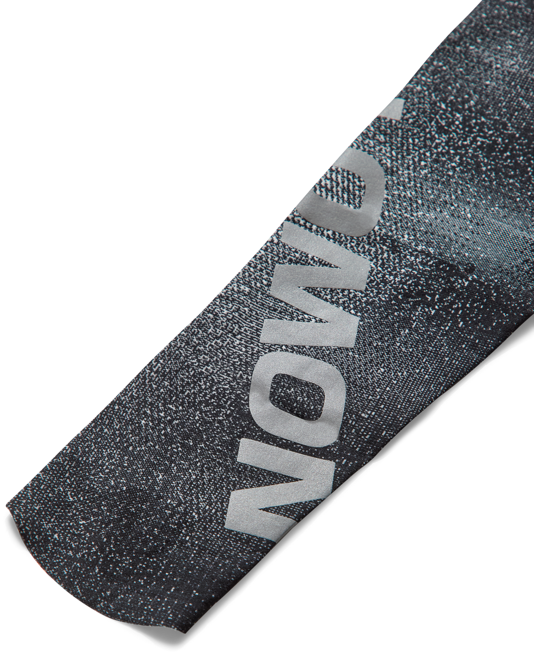 Detail of Salomon branding on WIND RUSH ARM SLEEVES, black compression sleeves engineered for trail runners