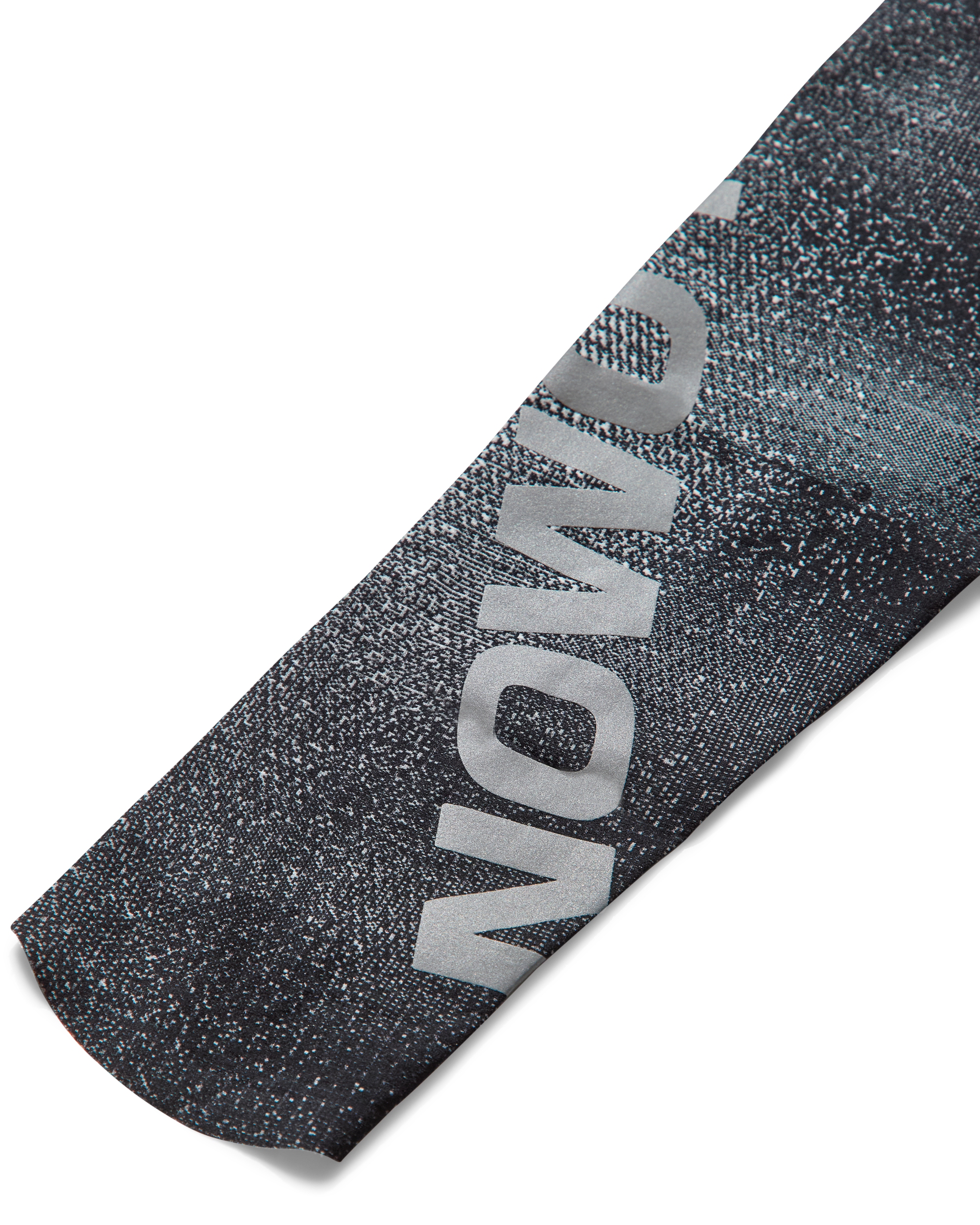 Detail of Salomon branding on WIND RUSH ARM SLEEVES, black compression sleeves engineered for trail runners