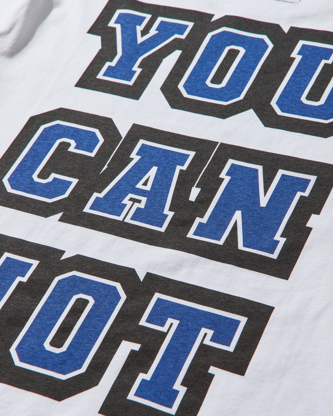 Close-up of chest monogram print and cotton texture.