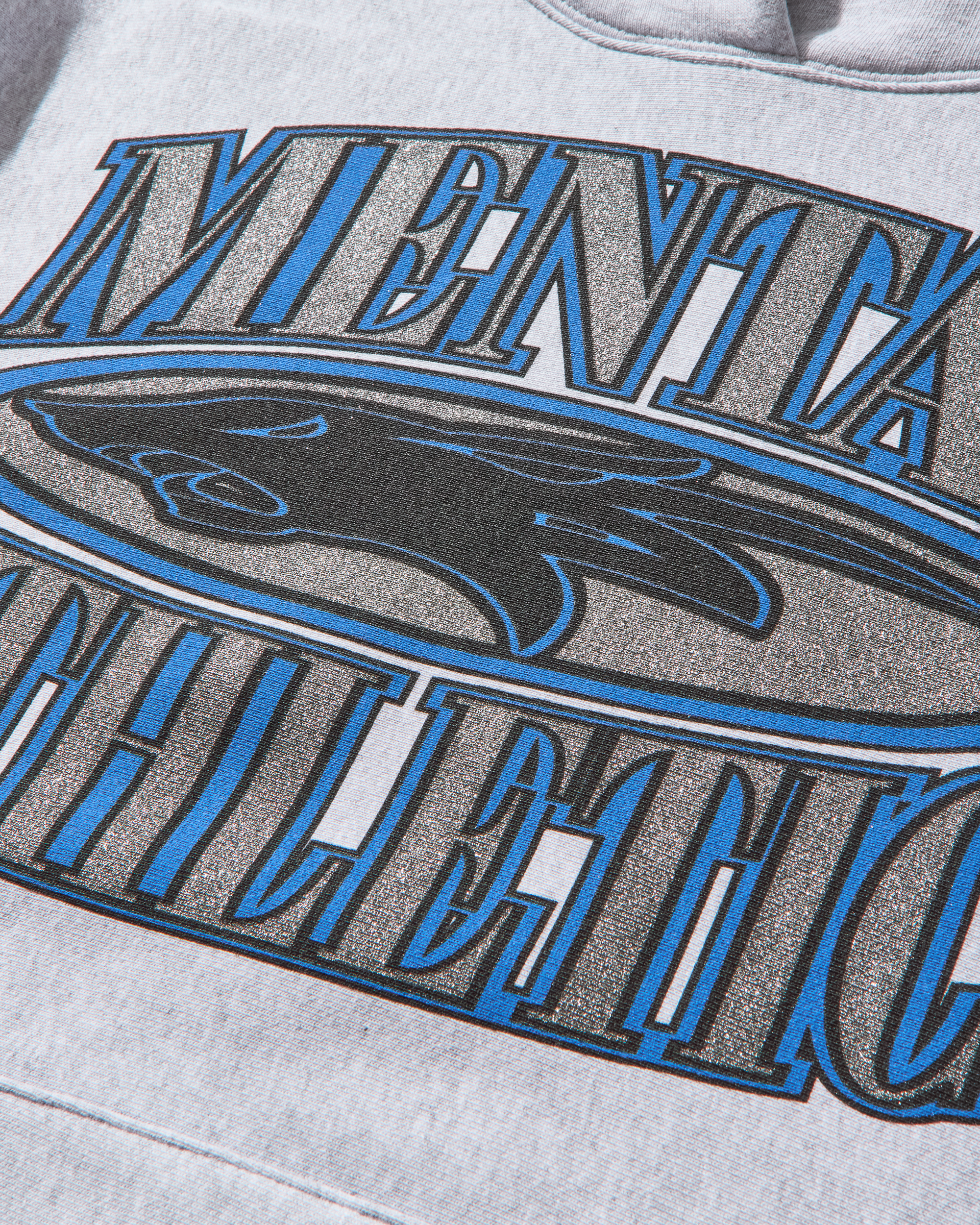 Close-up of wolf print design on Mental Athletic cotton sportswear hoodie.