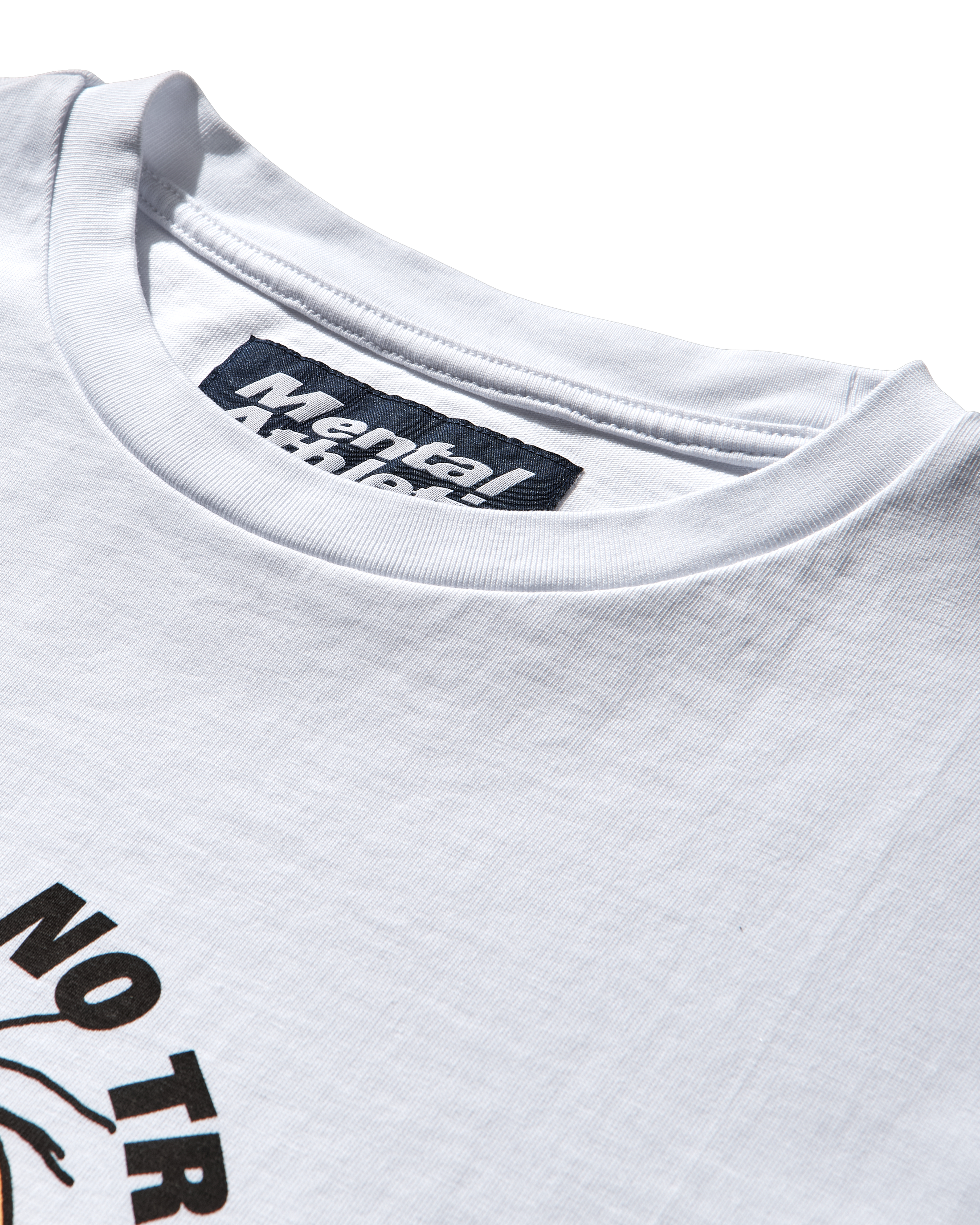 Close-up of Mental Athletic woven neck label inside white t-shirt.