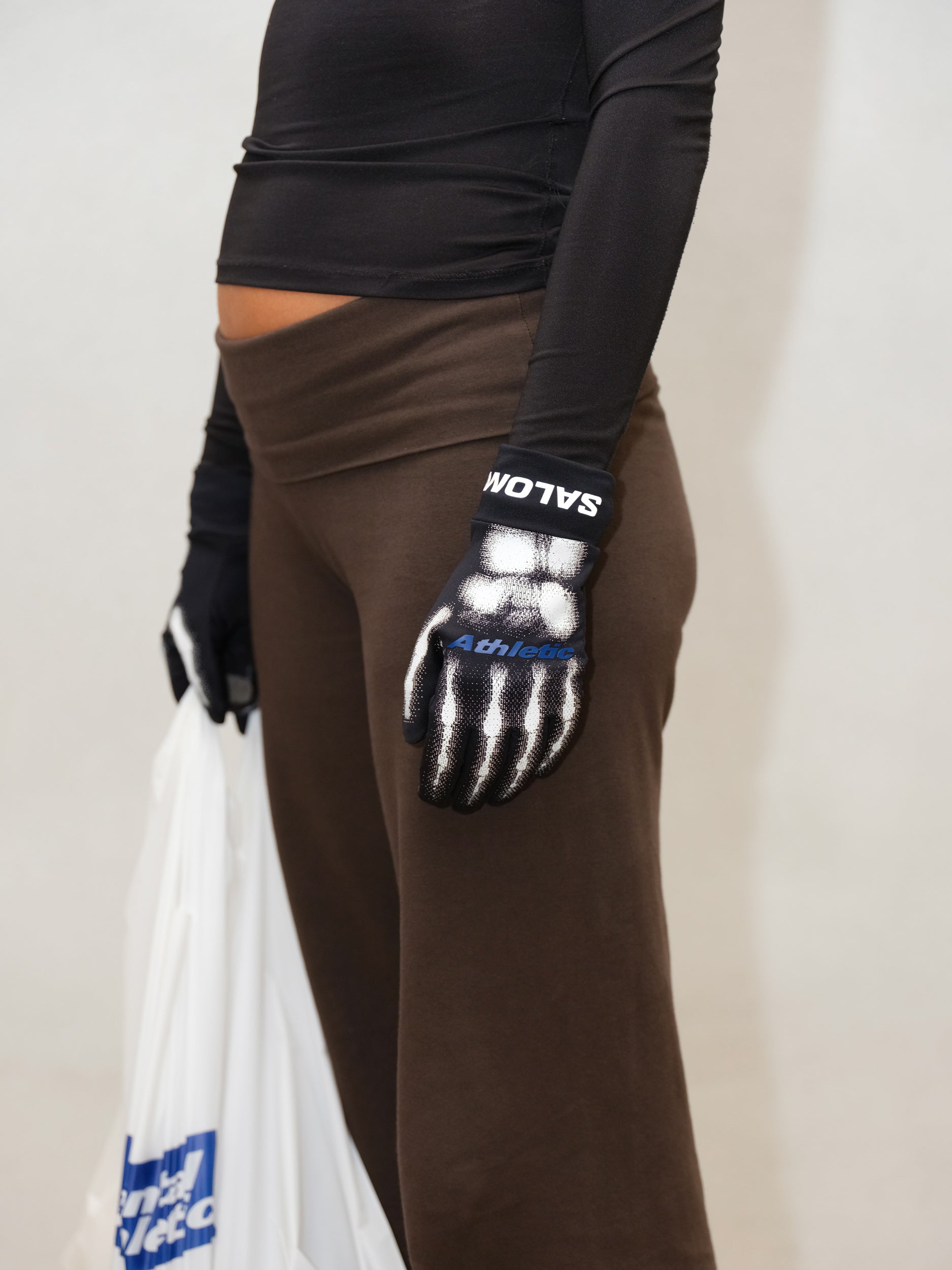 Mental Athletic BURNT KNUCKLES GLOVES detail, worn during movement while carrying gear, breathable fabric with skeleton design