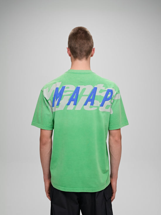 Mental Athletic x MAAP green cotton t-shirt with reflective MAAP back graphic, worn on body, back view.