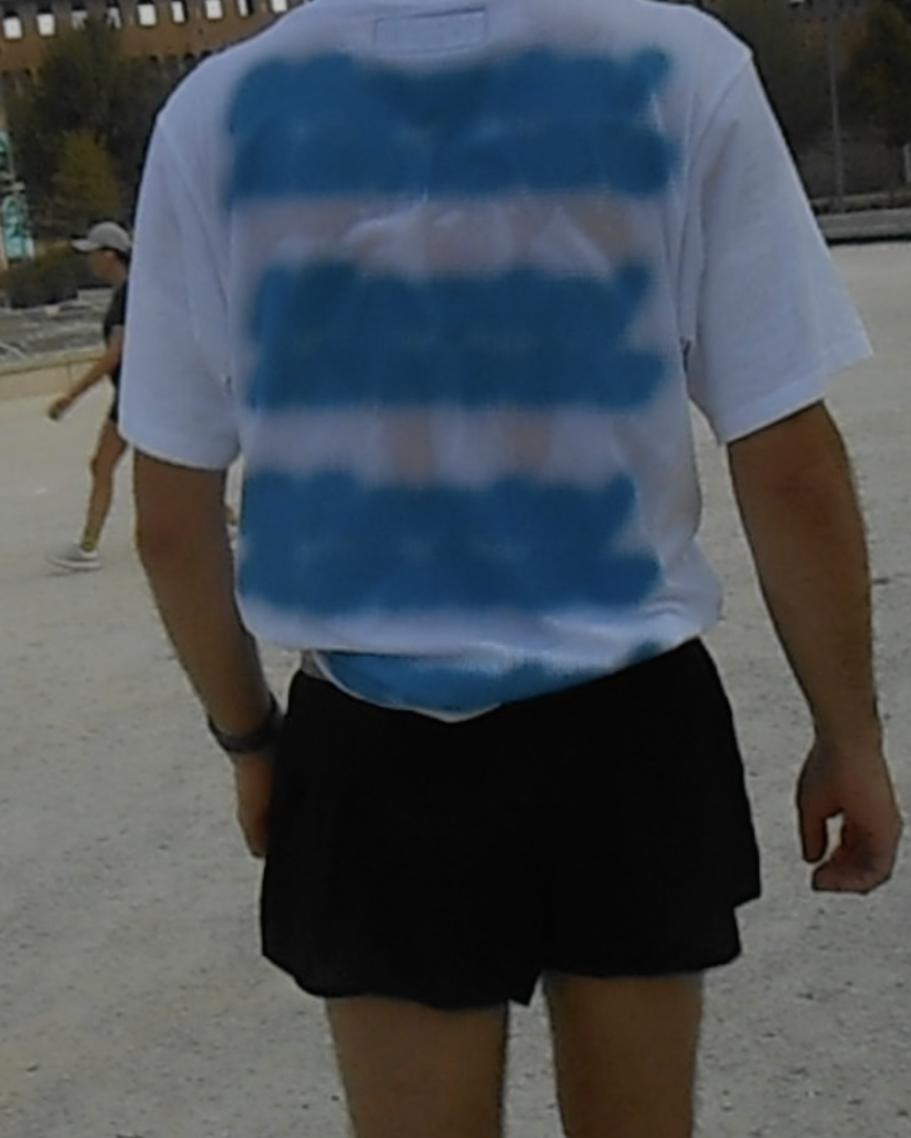 Mental Athletic white cotton t-shirt worn on body, back lifestyle view.