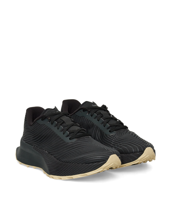 Angled view of the black ACG Ultrafly Trail SP showing the Fit Band lacing system.