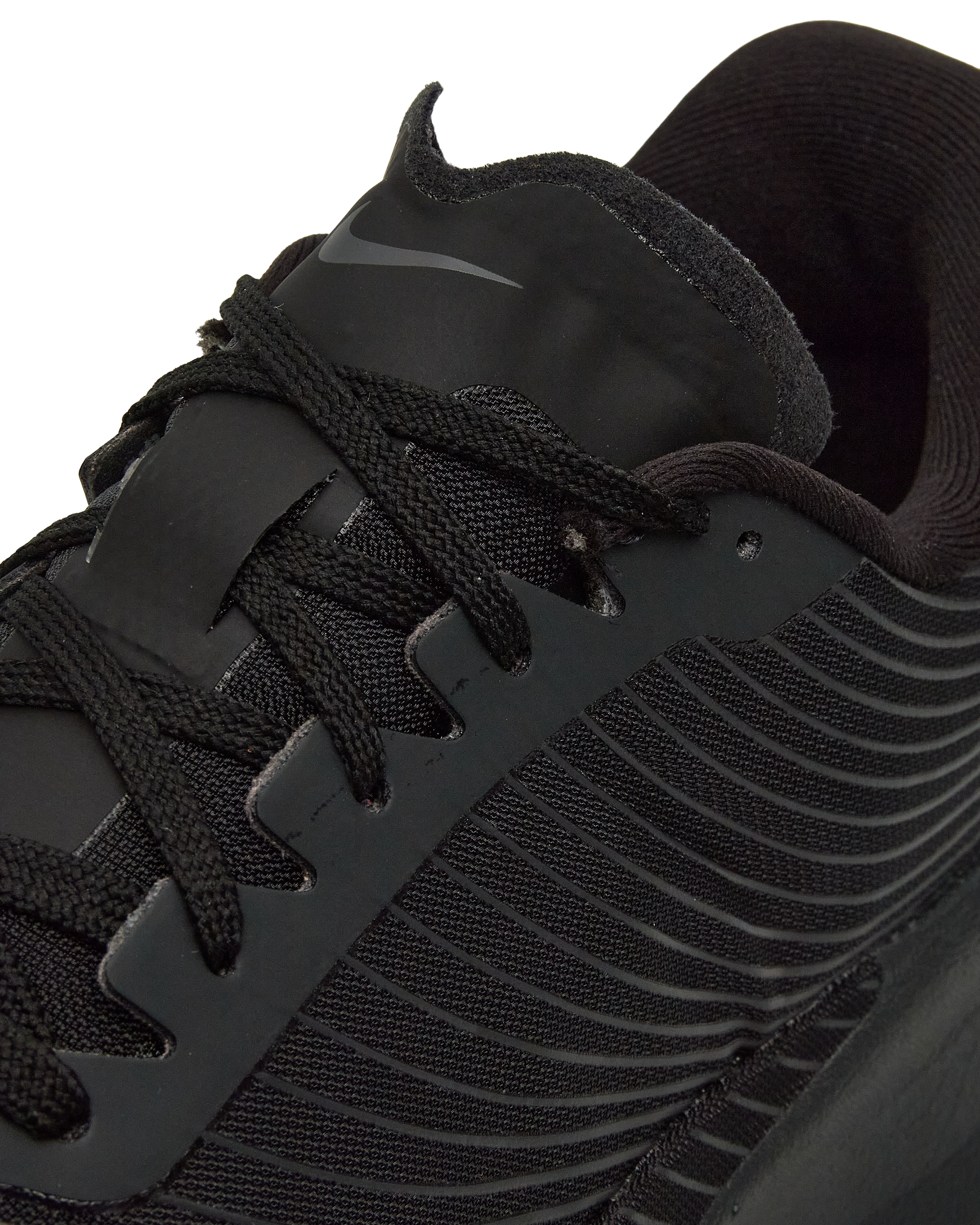 Close-up of the black ACG Ultrafly Trail SP VaporMesh texture and gusseted tongue.