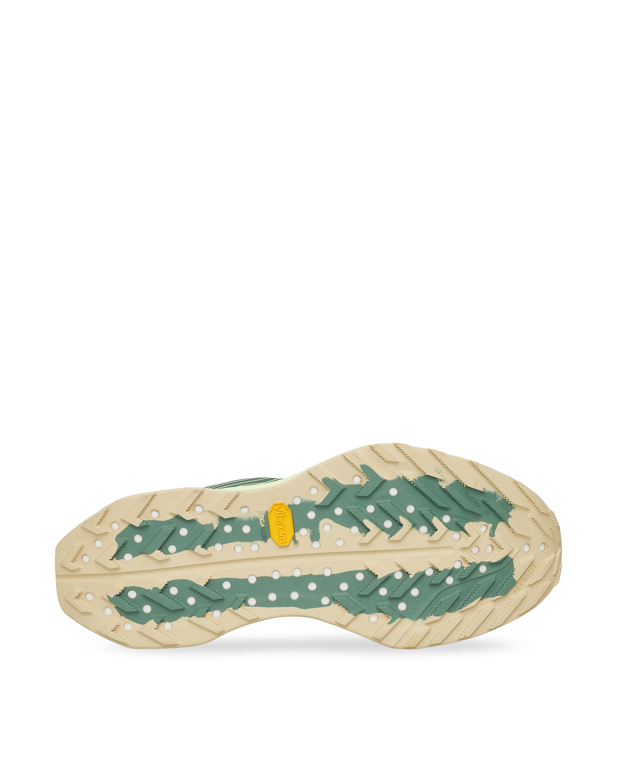 Detail of the green and beige Vibram® outsole on the ACG Ultrafly Trail SP.