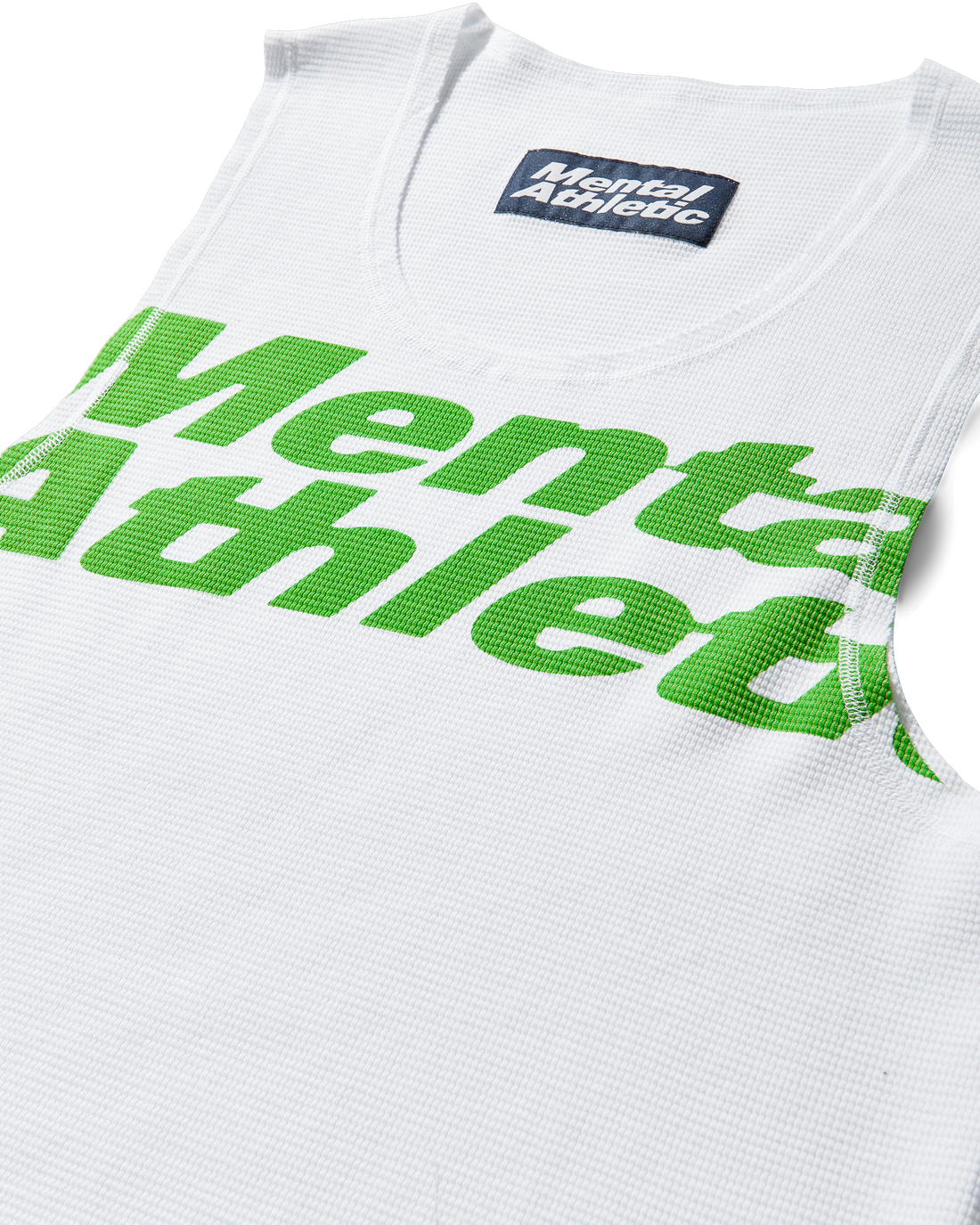Mental Athletic white cotton tank top close-up of green overlogo print.