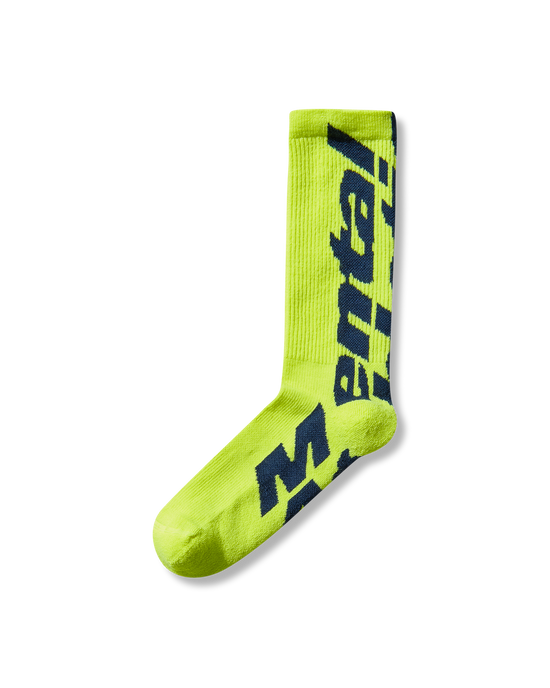 Mental Athletic neon yellow wool-blend socks with logo detail, angled view.