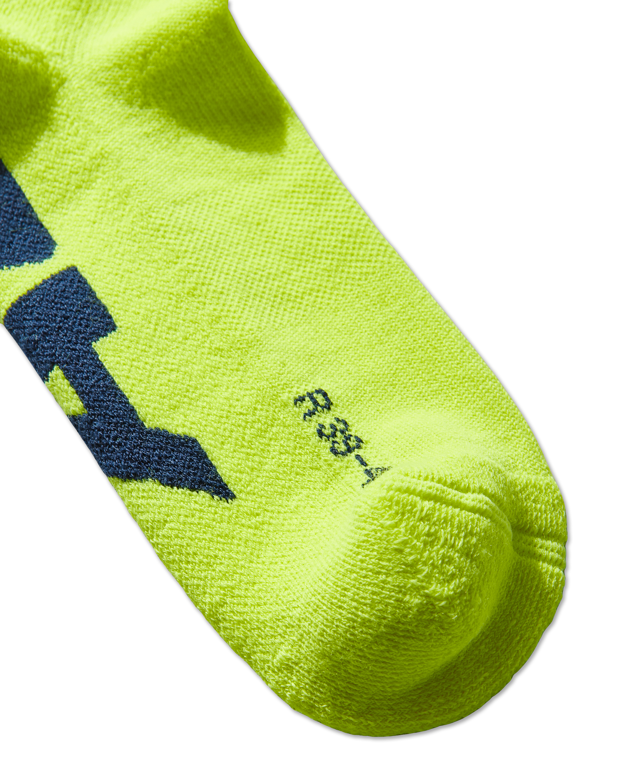 Mental Athletic neon yellow wool-blend socks close-up of toe and knit texture.
