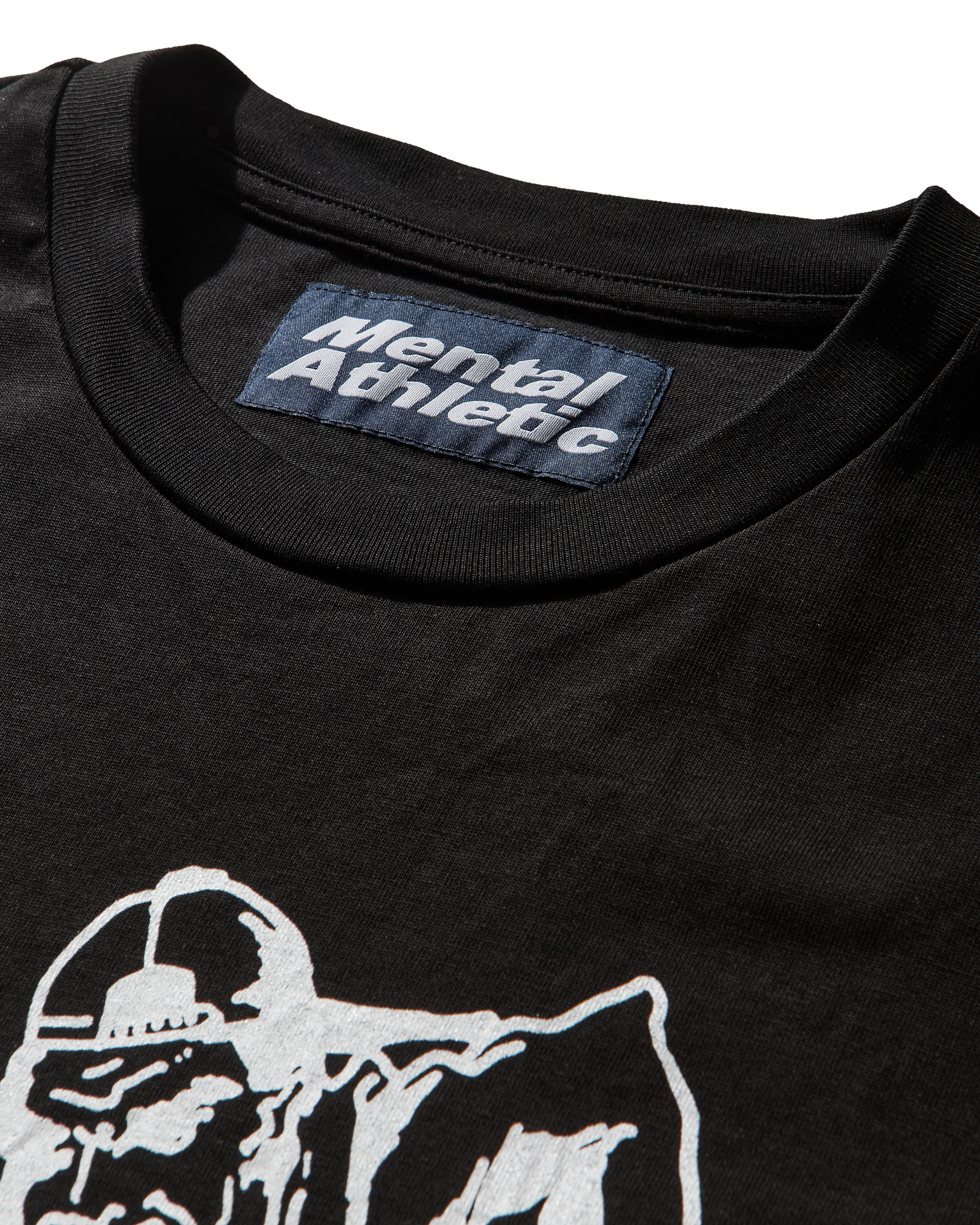 Mental Athletic “Tokyo Calling” black t-shirt detail of collar with woven label.