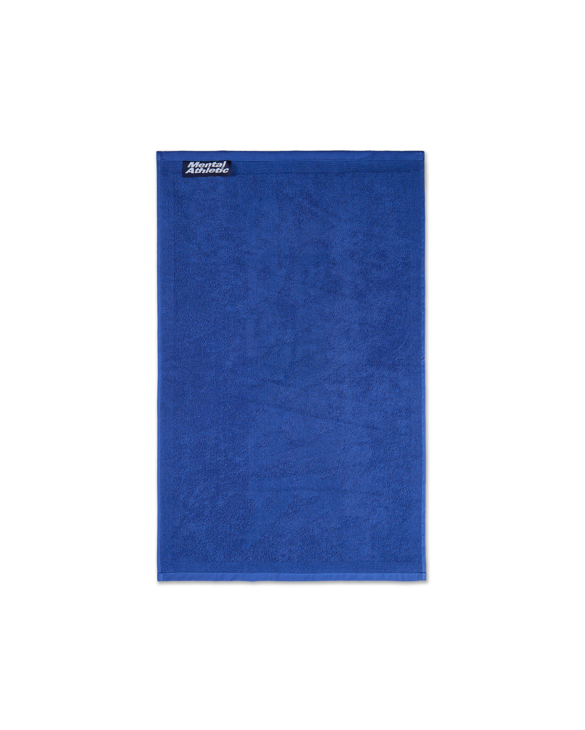 Full-length view of the small blue cotton terry towel with a tonal Mental Athletic jacquard design.