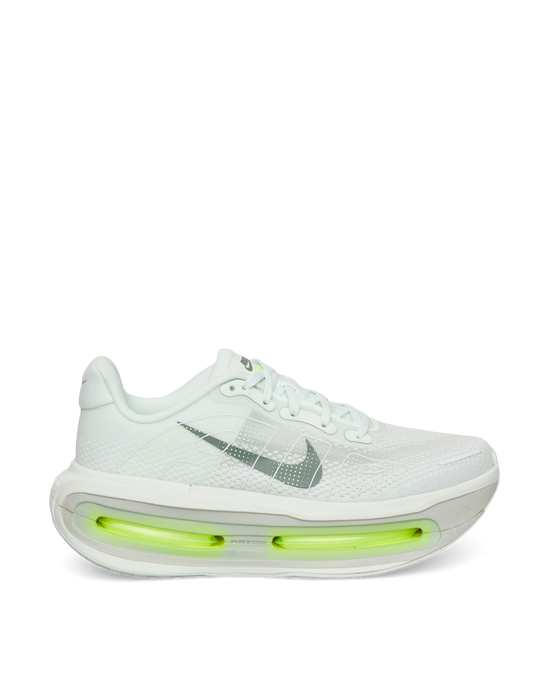 Nike Vomero Premium profile shot — sleek silhouette with neon Air Zoom details.