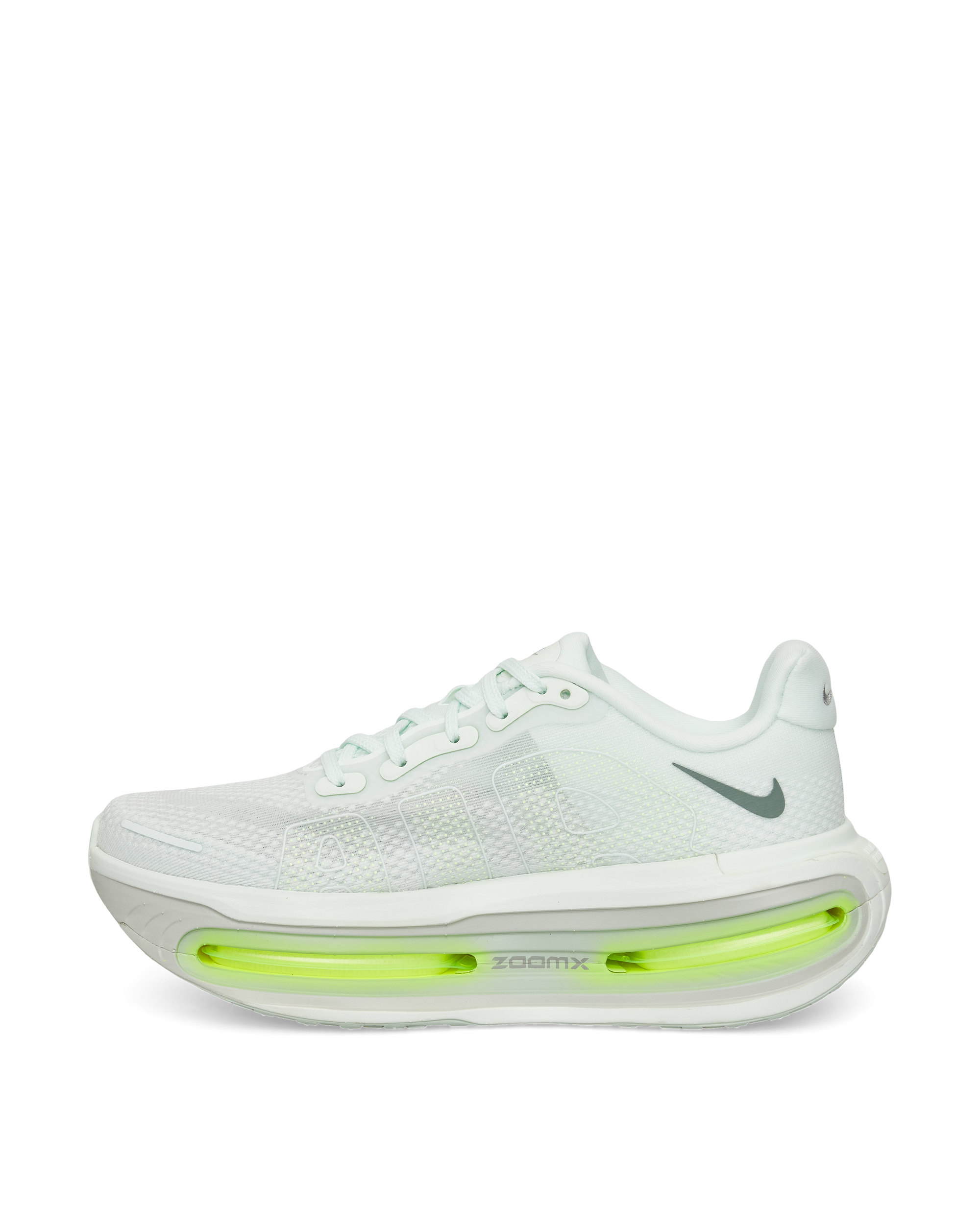 Nike Vomero Premium profile shot — sleek silhouette with neon Air Zoom details.